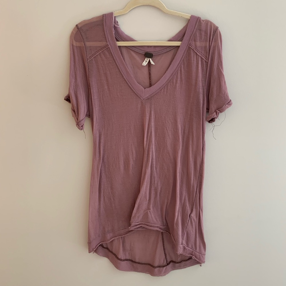 Slightly see through V-neck Free People tee.